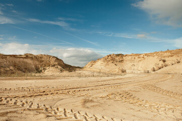 sand quarry, in the photo, a quarry for the extraction of sand against a blue sky