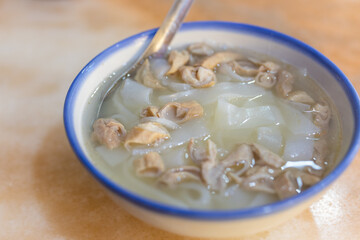 Pork intestine rice flat noodle in restaurant