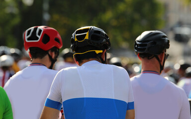 cyclist with protective helmet at the start of a cycling race