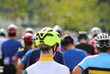 cyclist with protective helmet at the start of a cycling race