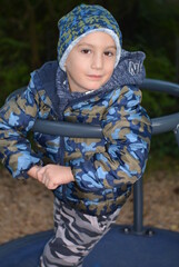portrait of a child on a merry go round 