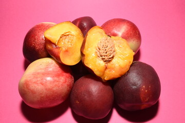 plums on a black background