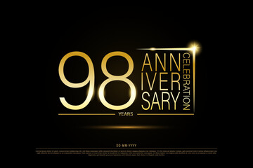 98 years golden anniversary gold logo on black background, vector design for celebration.