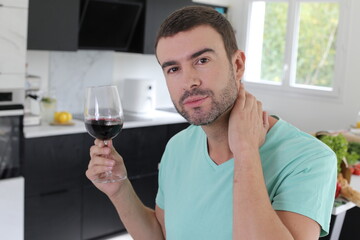 Man enjoying a glass of red wine 