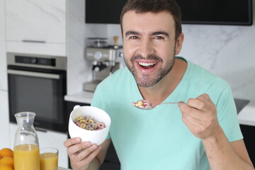 Man having some cereals for breakfast 