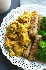 eggs with sausage and vegetables