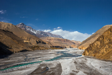 Kali Gandaki river valley in sunny autumn day. View from trekking route from Kagbeni to Jomsom.