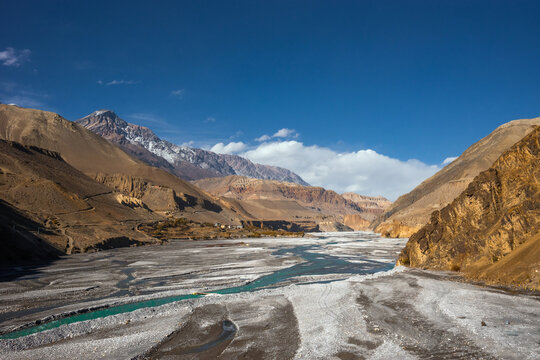 Kali Gandaki river valley in sunny autumn day. View from trekking route from Kagbeni to Jomsom.