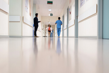 People standing in hospital hall