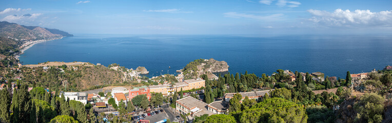 Obraz premium Aerial wide angle view of Taormina and its beautiful coastline