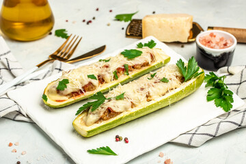 baked Zucchini stuffed with meat and cheese. Zucchini boats. Delicious balanced food concept. place for text, top view