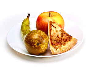 Isolated apple, pear and pizza on a white plate