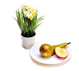 Juicy pear, red apple and potted flower