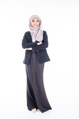 Portrait of Muslim woman in office attire and wearing a hijab. Asian woman in a corporate world. Formal corporate outfit and elegant appearance. Corporate or business people concept. Isolated