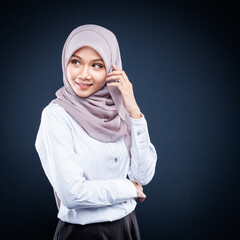 Close up portrait of Muslim woman in office attire and wearing a hijab. Asian woman in a corporate world. Formal corporate outfit and elegant appearance. Corporate or business people concept. Isolated