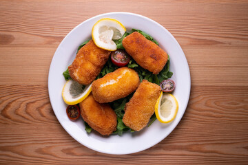 Fish croquettes. Traditional tapas of the coastal areas in Spain.