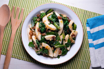 Cuttlefish cooked with chard and spinach. Spanish traditional tapas.