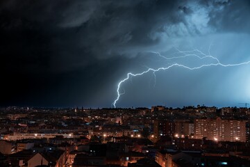 Scenic view of lightning hitting the ground near the city of Madrid during nighttime