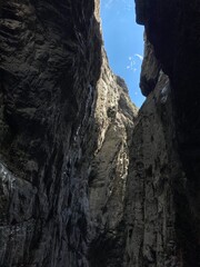 Canyon in Switzerland Europe Grindelwald. Big rocky canyon in Switzerland with river on the bottom and waterfalls. Switzerland landscape in the summer sunny day. Nature canyon landscape with the trees