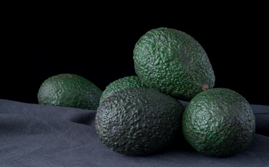 Persea americana fruit cut into two with seed, Avocado