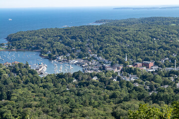 Elevated view of harbor and town in ME.