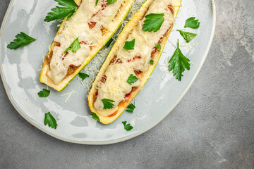 Zucchini stuffed with meat and cheese. Restaurant menu, dieting, cookbook recipe top view