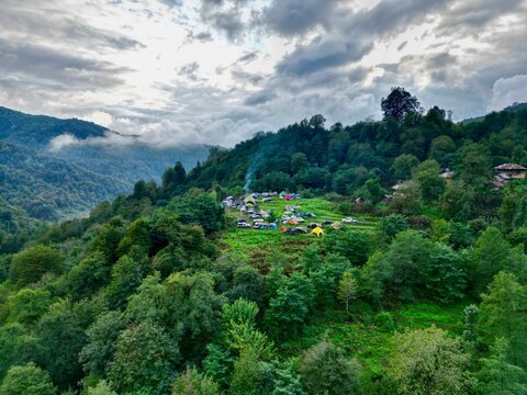 Beautiful green landscape with camping travel trailers