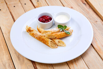 pancakes with jam and sour cream