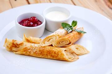 pancakes with jam and sour cream