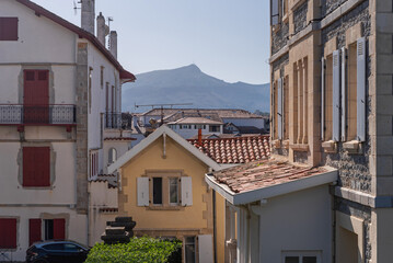Facades of Saint Jean de Luz. Mount La Rhune in the background
