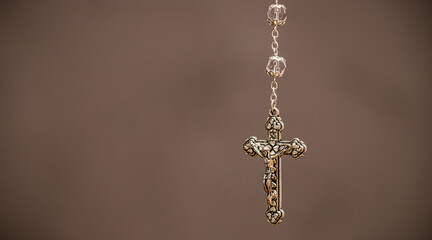 crucifix, macro photography, christian and catholic symbol, background with copyspace, image of jesus christ crucified.