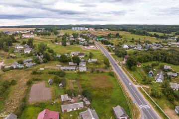 Fototapeta na wymiar panoramic aerial view of private development with country houses or village