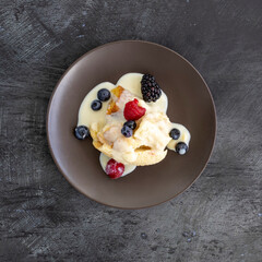 A Plate of Bread Pudding with Berries