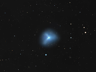 Fototapeta na wymiar Blue comet among the stars
