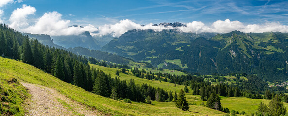 Fototapeta na wymiar Views on high peaks of Swiss Alps as seen from Hoch Ybrig