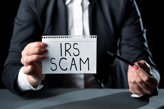 Sign Displaying Irs Scam. Word For Targeted Taxpayers By Pretending To Be Internal Revenue Service