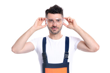 repairman in studio. positive repairman wear working glasses isolated on white background.
