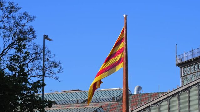 Huge Catalan Flag Flies In Front Of El Born Cultural Center In Barcelona, Spain.