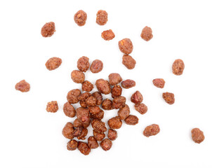 a handful of peanuts in caramel on white background, isolate