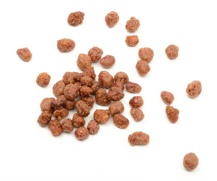 A Handful Of Peanuts In Caramel On White Background, Isolate