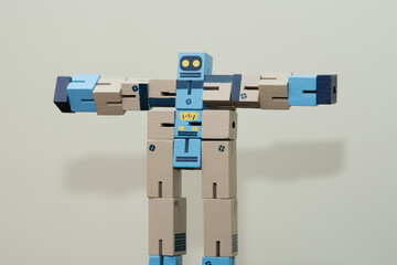 frontal portrait of a handmade wooden Robot figur