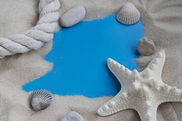 Starfish and clean sand, background with space for your text. The theme of traveling to the sea.