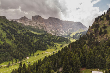 Landscape of Italian Dolomites in summer with green meadows