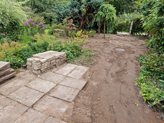 Paved yard after water pipe repairs. Unfinished work.