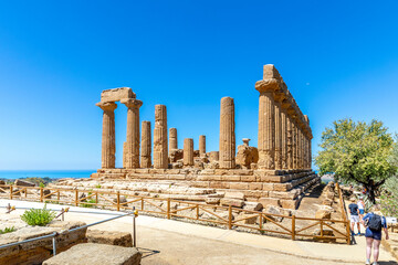 Agrigento, Sicily, Italy - July 12, 2020: The temple of Juno, in the valley of the temples of Agrigento in Sicily - obrazy, fototapety, plakaty