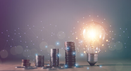 Fototapeta premium Inspiration ideas for financial and business growth concept, Coins stack increasing step by step with bright of light bulb, Business Strategy, Finance and banking, Forecast for success.