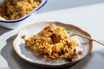 Vegan dish of parsnip, leek and bean crumble with crispy topping