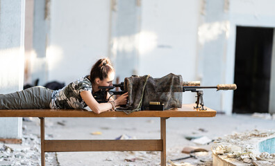 female sniper with a rifle