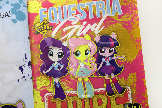 Twilight Sparkle, Fluttershy, Rarity. Magazine with the characters of Equestria Girls. My little Pony. TV series. Illustration. Modern and fashion girls. Teenagers.