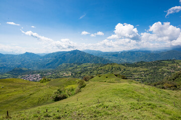 Landscape with blue sky and the beautiful mountains of Venecia, Antioquia, Colombia.